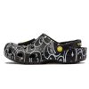 Crocs (WMNS) Smiley World Classic Clogs “Black White Yellow” 873137